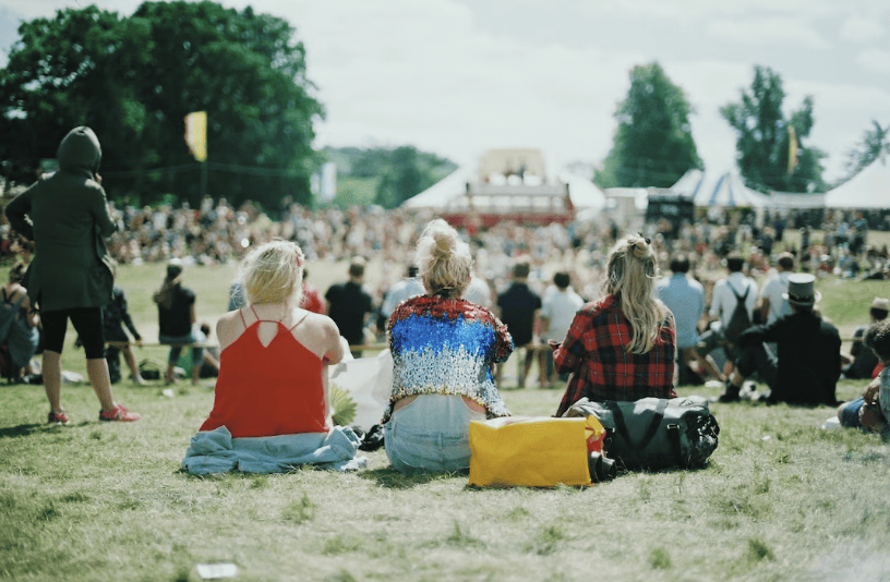 Three women at a music festival