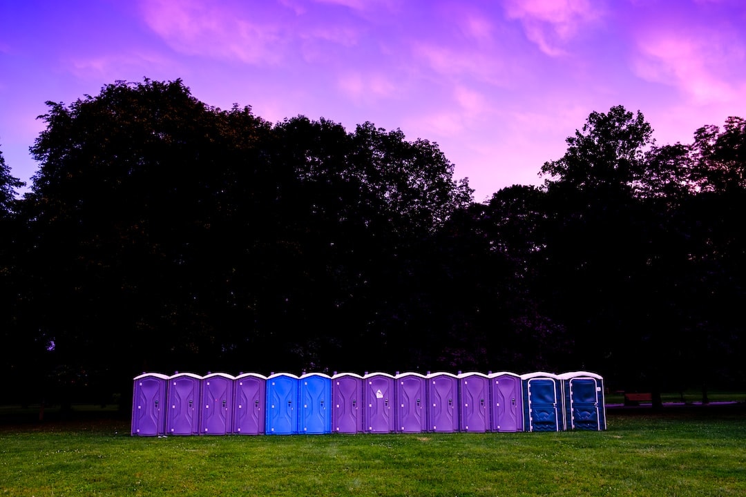 Row of purple porta potties